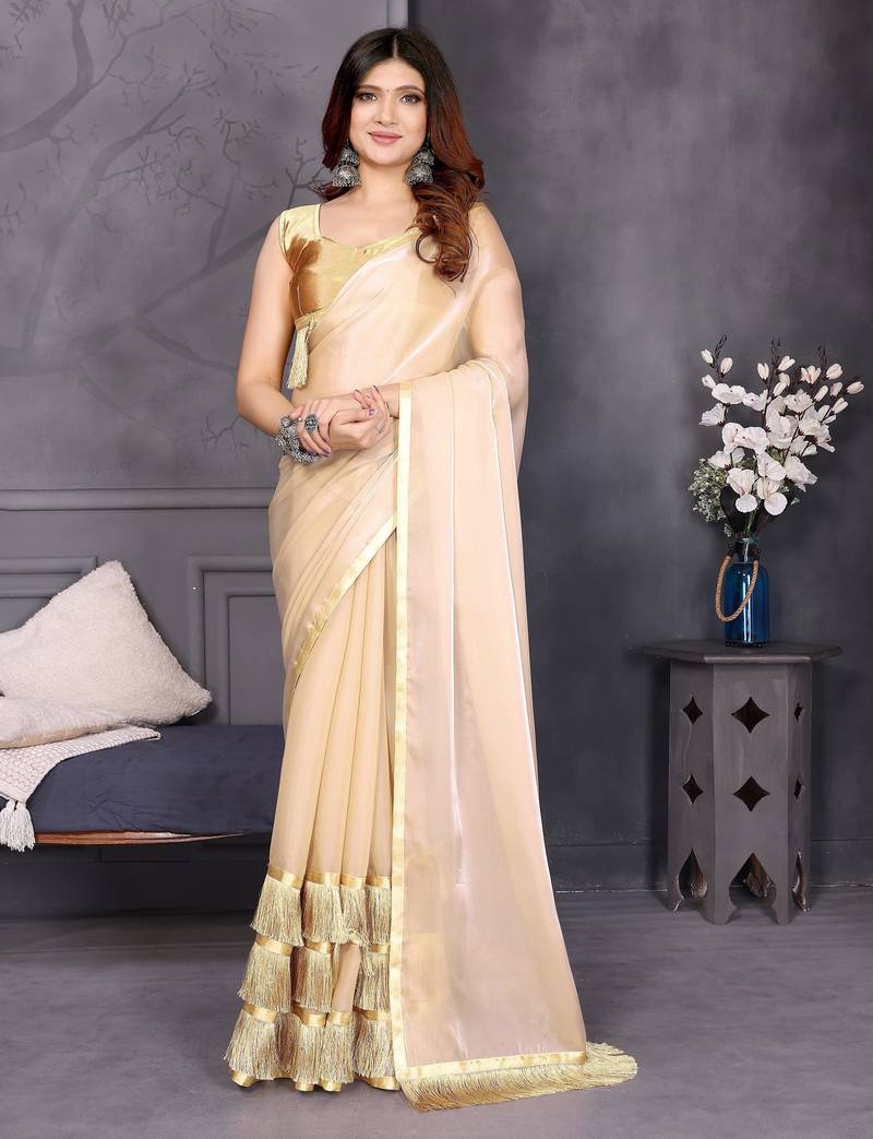 Resham sutra cream silk blend tassel saree with satin gold blouse piece