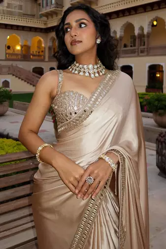 beige satin saree with mirror embroidery border