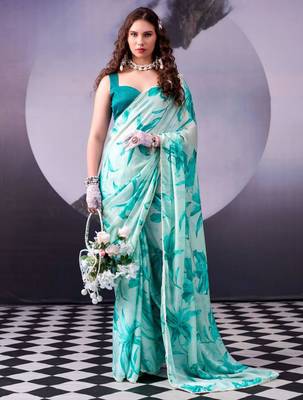rama green satin saree with printed leaf motifs 1