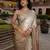 beige satin saree with mirror embroidery border