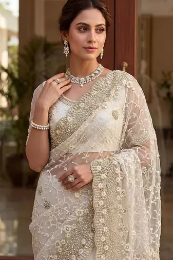 off white net saree with floral embroidery work