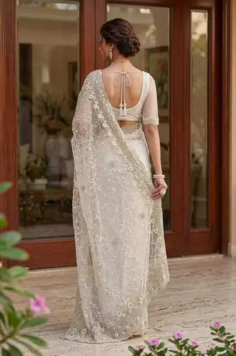 off white net saree with floral embroidery work