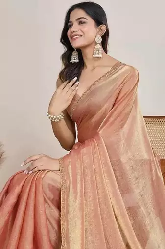 peach chiffon saree with hand embroidered lace border