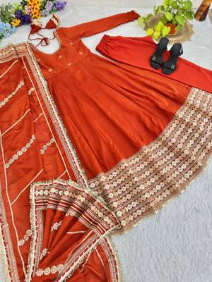 orange silk blend anarkali gown set with embroidered border


 2