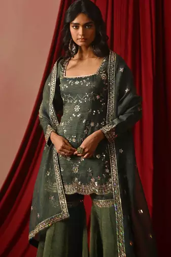 green silk blend embroidered sharara set with dupatta