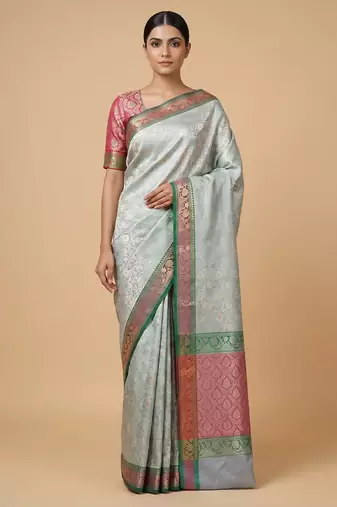Banarasi semi silk saree in light green colour with  tanchoi meenakari  work