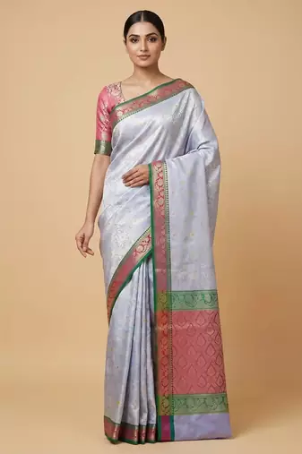 Banarasi semi silk saree in light blue colour with  tanchoi meenakari  work
