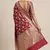 Banarasi semi silk saree in  red colour with  floral zari jaal  work