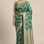 Banarasi semi silk saree in  green colour with  floral zari jaal  work