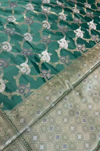 emerald green semi silk floral zari jaal banarasi saree