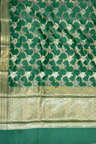 emerald green semi silk floral zari jaal banarasi saree