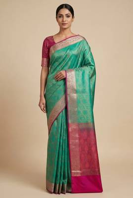 green semi silk tanchoi banarasi saree with pink border 1