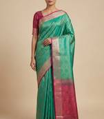 green semi silk tanchoi banarasi saree with pink border