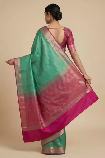green semi silk tanchoi banarasi saree with pink border