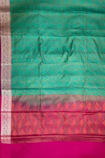 green semi silk tanchoi banarasi saree with pink border