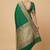 Banarasi mashru silk saree in  green  with  floral zari with booti   work