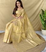 beige tissue saree with woven elephant border design