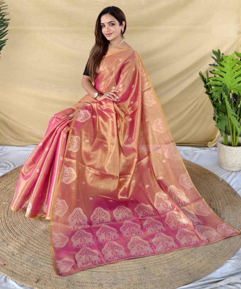 Pink zari tissue weaving saree with all over elephant pattern motifs on border