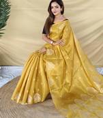 yellow tissue saree with zari elephant border design