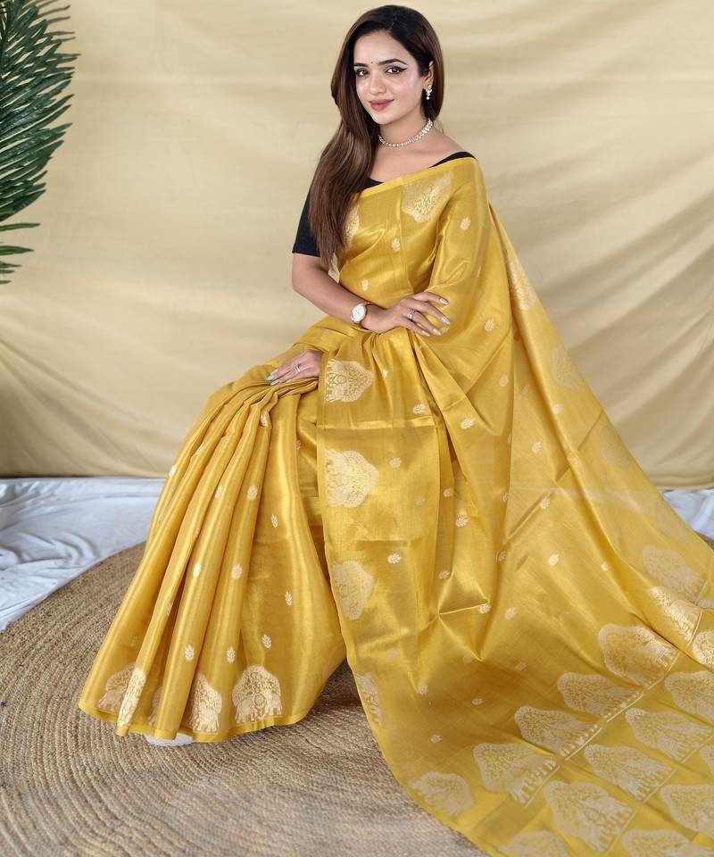Yellow zari tissue weaving saree with all over elephant pattern motifs on border
