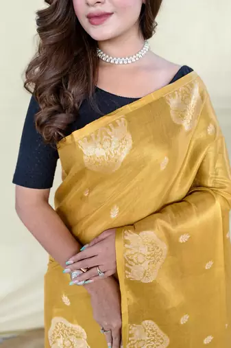 yellow tissue saree with zari elephant border design