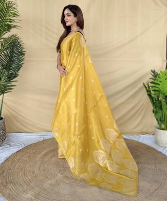 yellow tissue saree with zari elephant border design 5