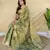 green tissue saree with zari elephant border design