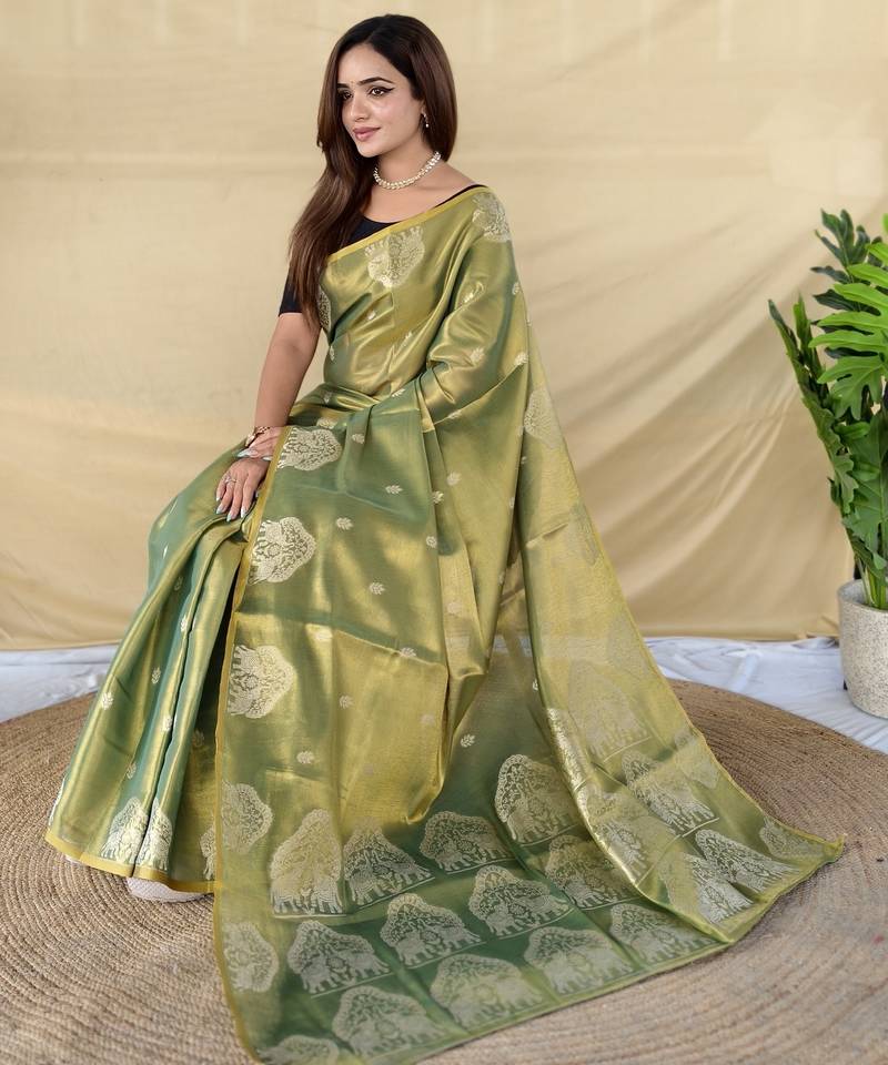 Green zari tissue weaving saree with all over elephant pattern motifs on border