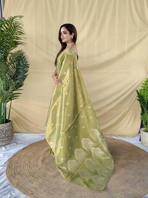 green tissue saree with zari elephant border design 3