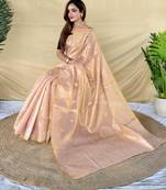 light pink tissue saree with zari elephant border design