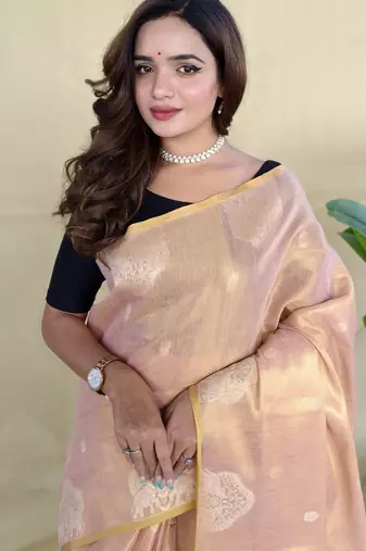 light pink tissue saree with zari elephant border design