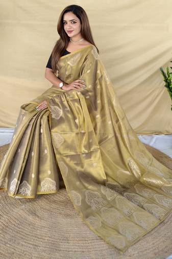 Green zari tissue weaving saree with all over elephant pattern motifs on border