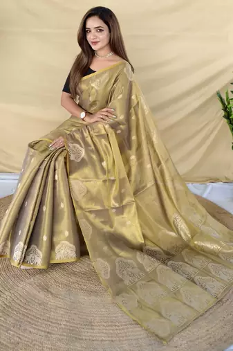 Green zari tissue weaving saree with all over elephant pattern motifs on border