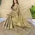 green tissue saree with zari elephant motif border