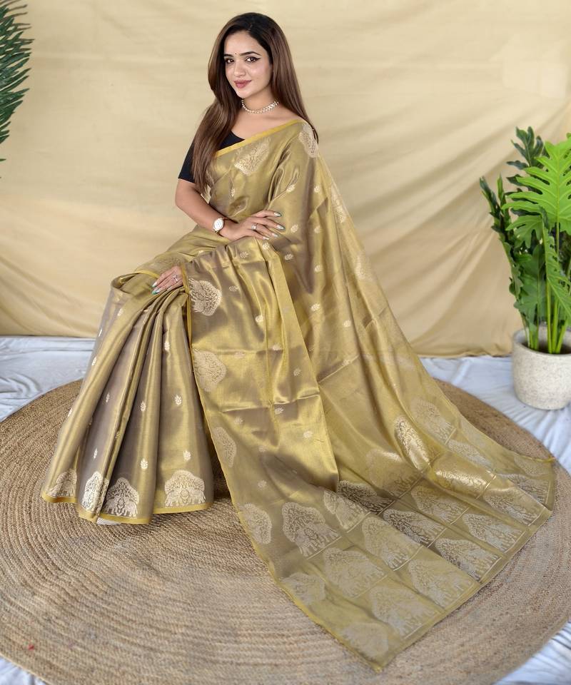 Green zari tissue weaving saree with all over elephant pattern motifs on border