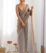 Women embellished sequinned tissue designer saree