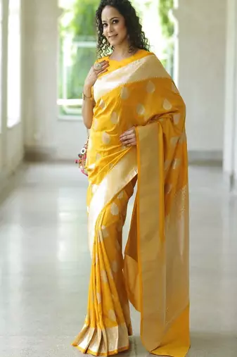 yellow art silk kanjeevaram saree with woven zari design