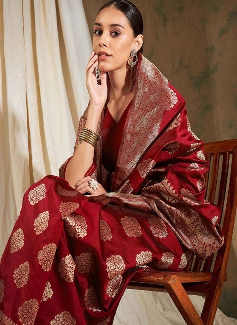 Red ethnic motifs woven design zari banarasi saree