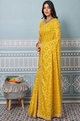 yellow art silk bandhani saree with sequinned work 1