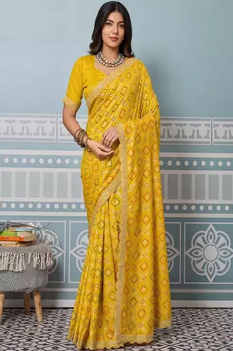 yellow art silk bandhani saree with sequinned work