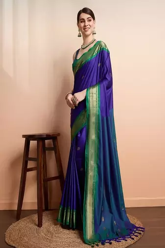 purple art silk kanjeevaram saree with ethnic woven motifs
