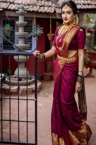 maroon art silk kanjeevaram saree with woven zari design