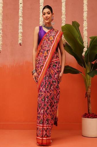 Women ethnic motifs printed zari patola saree