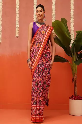 Women ethnic motifs printed zari patola saree