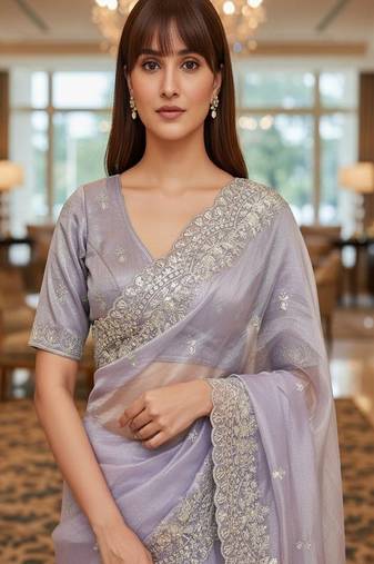 Embellished embroidered net heavy work saree