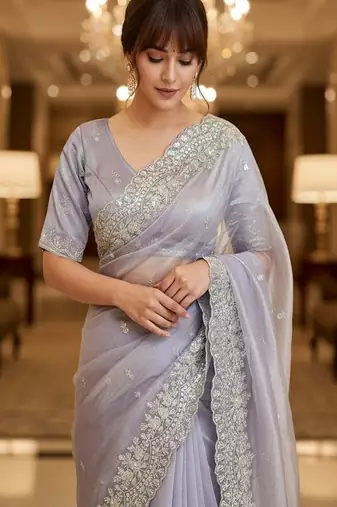 Embellished embroidered net heavy work saree