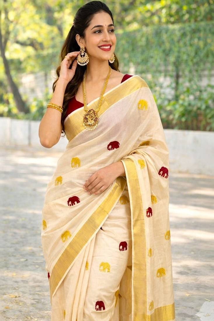 Maroon golden gaja embroidery kasavu tissue running blouse sarees
