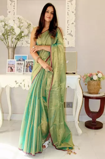 Women woven design tissue saree