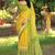 Yellow ethnic motifs printed ikat saree