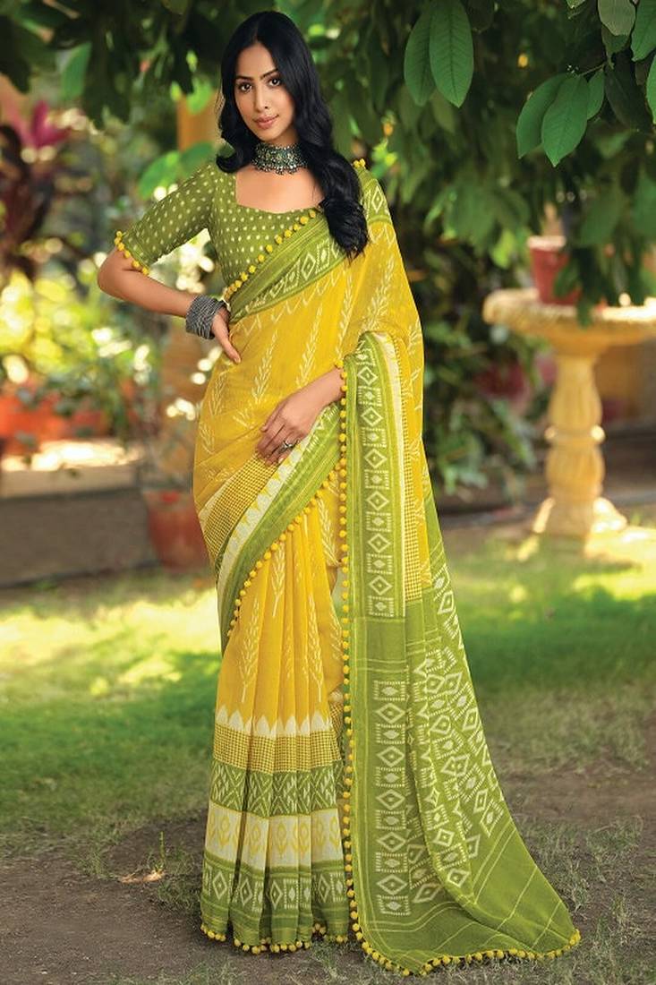 Yellow ethnic motifs printed ikat saree